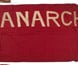 A flag with the word 'Anarchy' stiched in white.