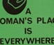This badge's slogan opposes the old saying that "a woman's place is in the kitchen."