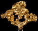 A brooch in the form of a gold nugget.