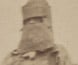 Photograph of a policeman wearing pieces of the Kelly armour.