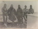 Photograph of explorers from the Australasian Antarctic Expedition (AAE), on board ship.