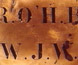 Brass plate bearing Burke & Wills' initials.